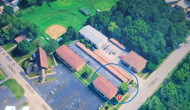 an aerial view of a house roof deck