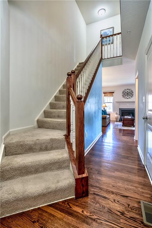Upon entry you are greeted by luxurious hardwood flooring & 9' ceilings throughout 1st floor.