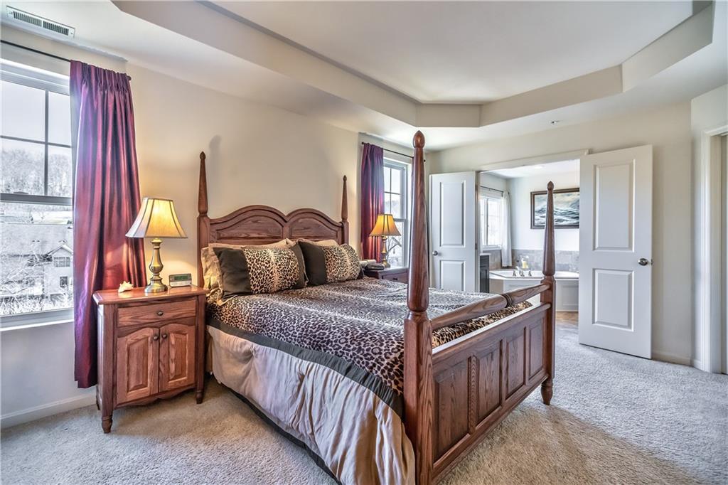 152 Harmony Road Wexford, PA 15090 - Photo 14 of 25 Another view of the master bedroom with double doors to the luxurious bathroom.