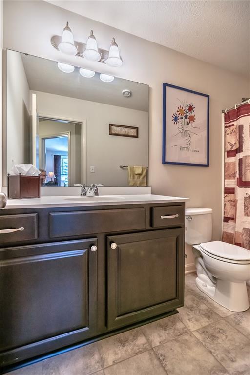 152 Harmony Road Wexford, PA 15090 - Photo 20 of 25 Shared hall bath is located next to the second floor laundry room, complete with cabinets for storage.