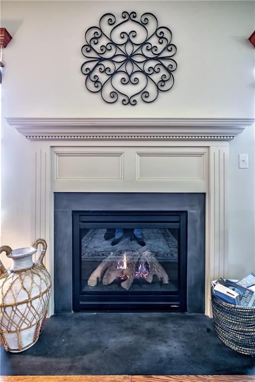Gas fireplace with a slate surround.