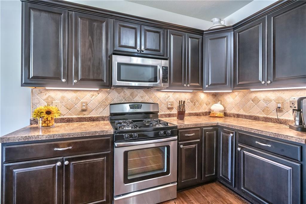 152 Harmony Road Wexford, PA 15090 - Photo 10 of 25 Another view of the kitchen with ample counter space and cabinets.