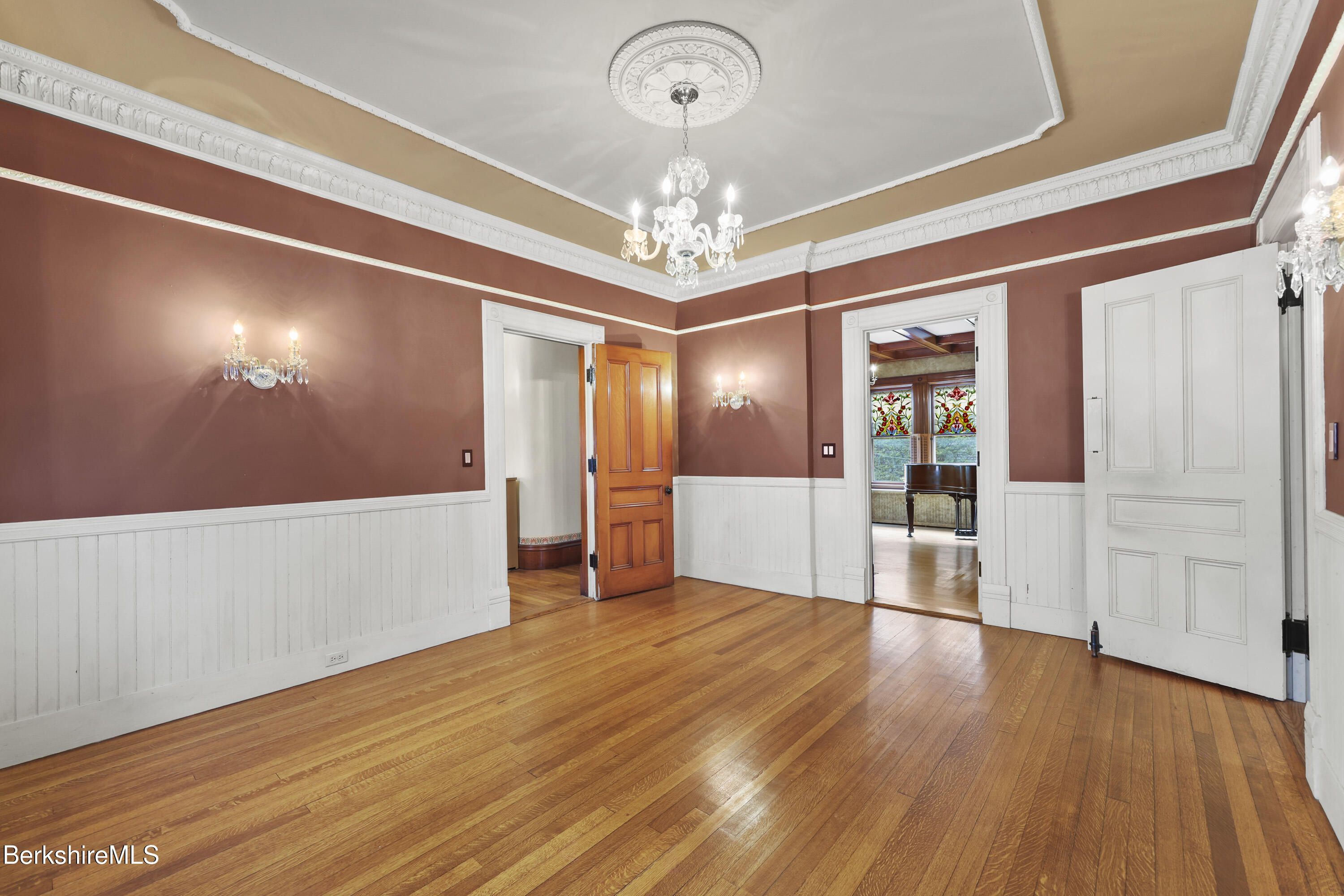 30 Summer Street Adams, MA 01220 - Photo 18 of 57 a view of a room with wooden floor chandelier and windows