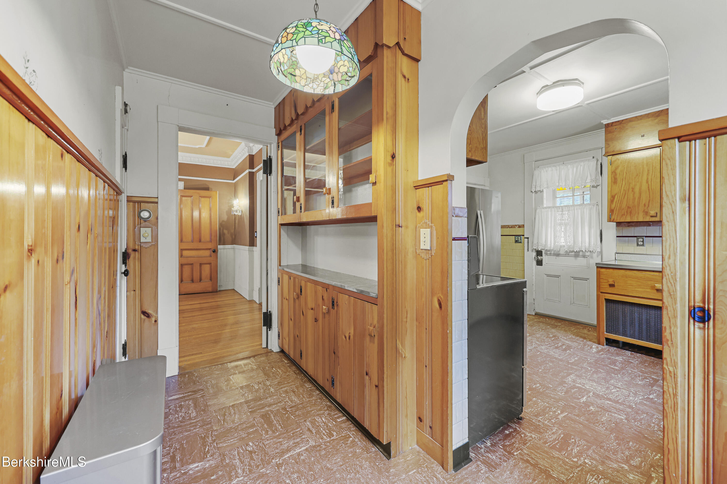 30 Summer Street Adams, MA 01220 - Photo 21 of 57 a view of a hallway with wooden floor and a kitchen
