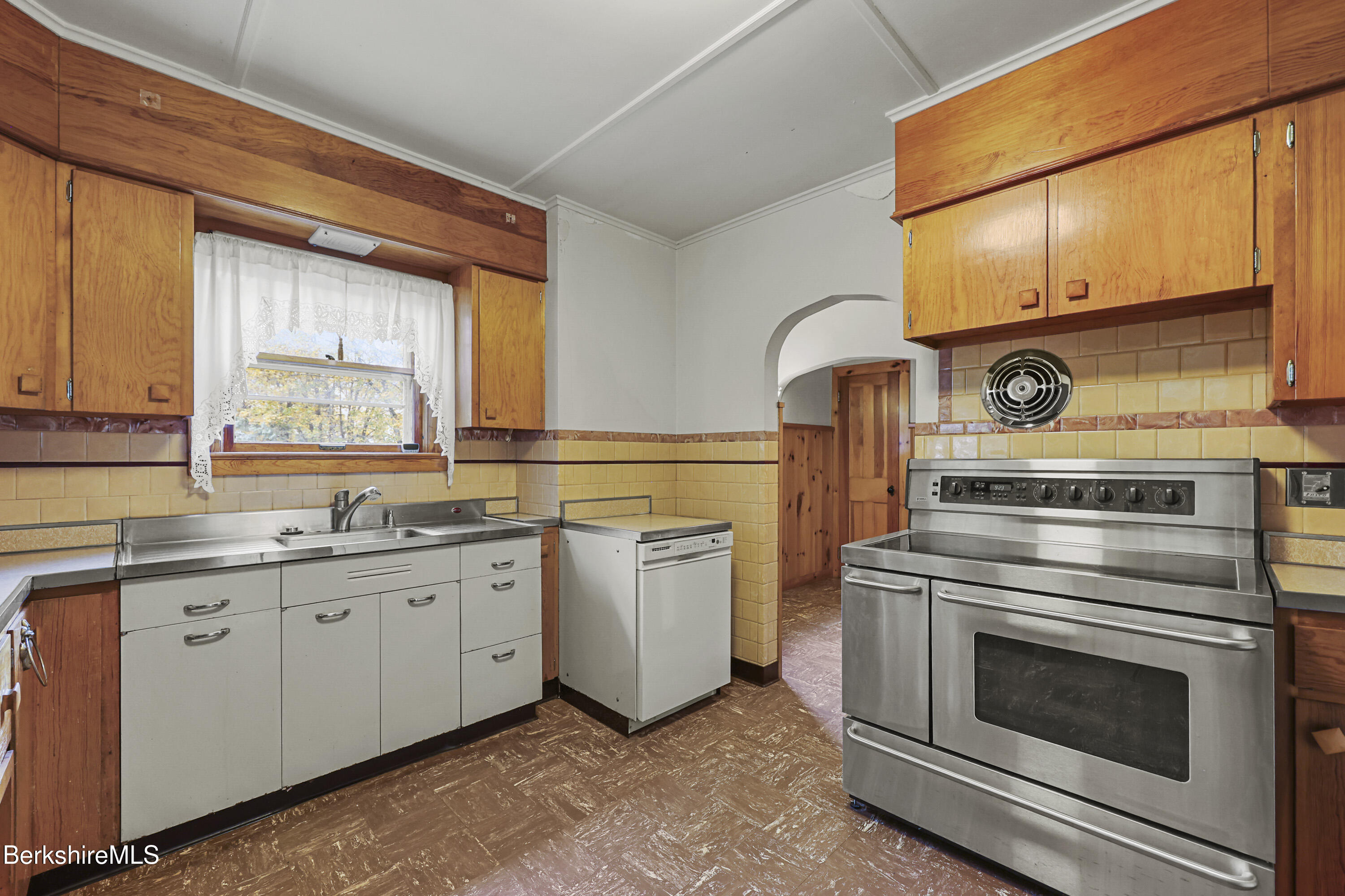 30 Summer Street Adams, MA 01220 - Photo 24 of 57 a kitchen with a stove microwave and sink