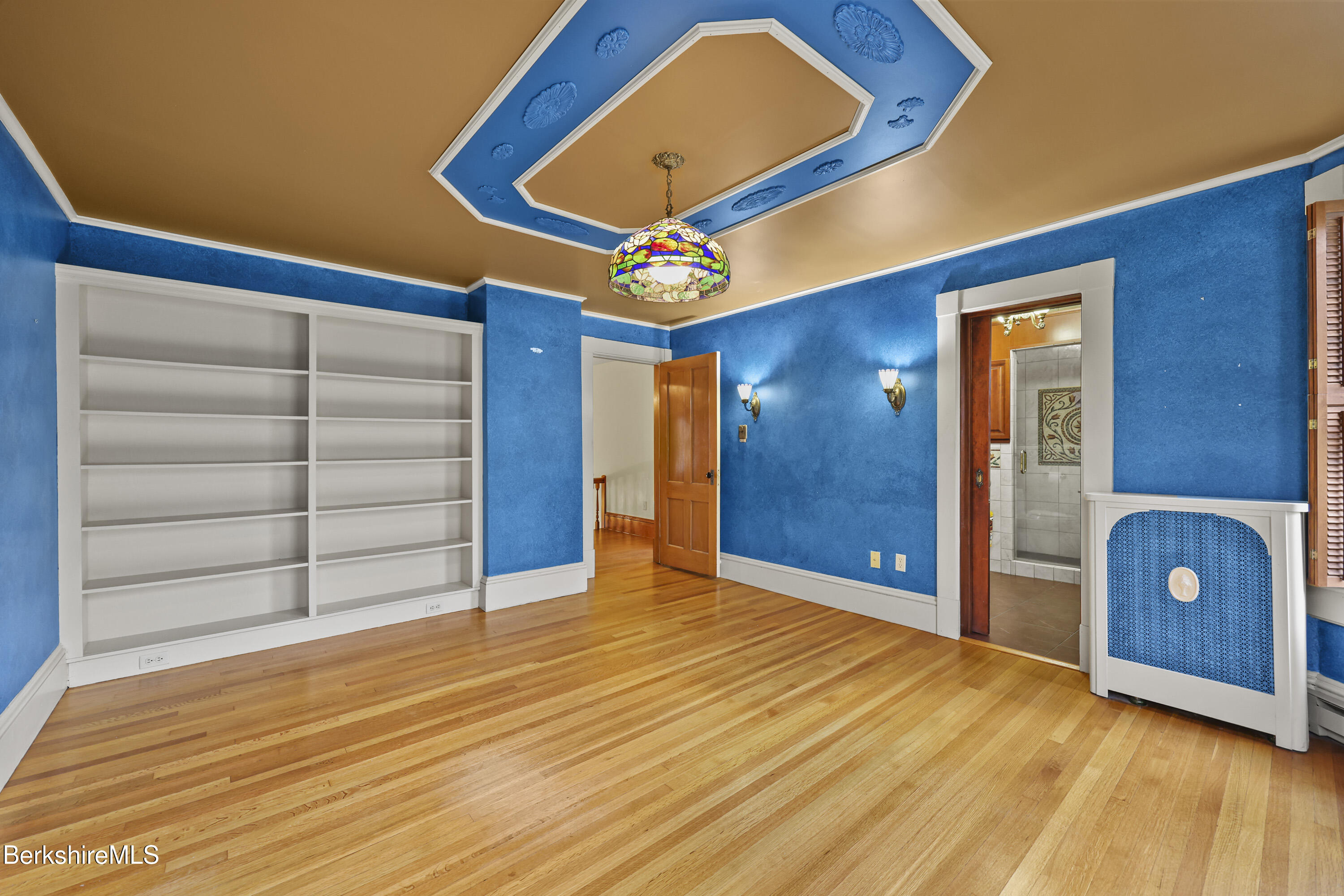 30 Summer Street Adams, MA 01220 - Photo 39 of 57 a view of an empty room with cabinet and a ceiling fan