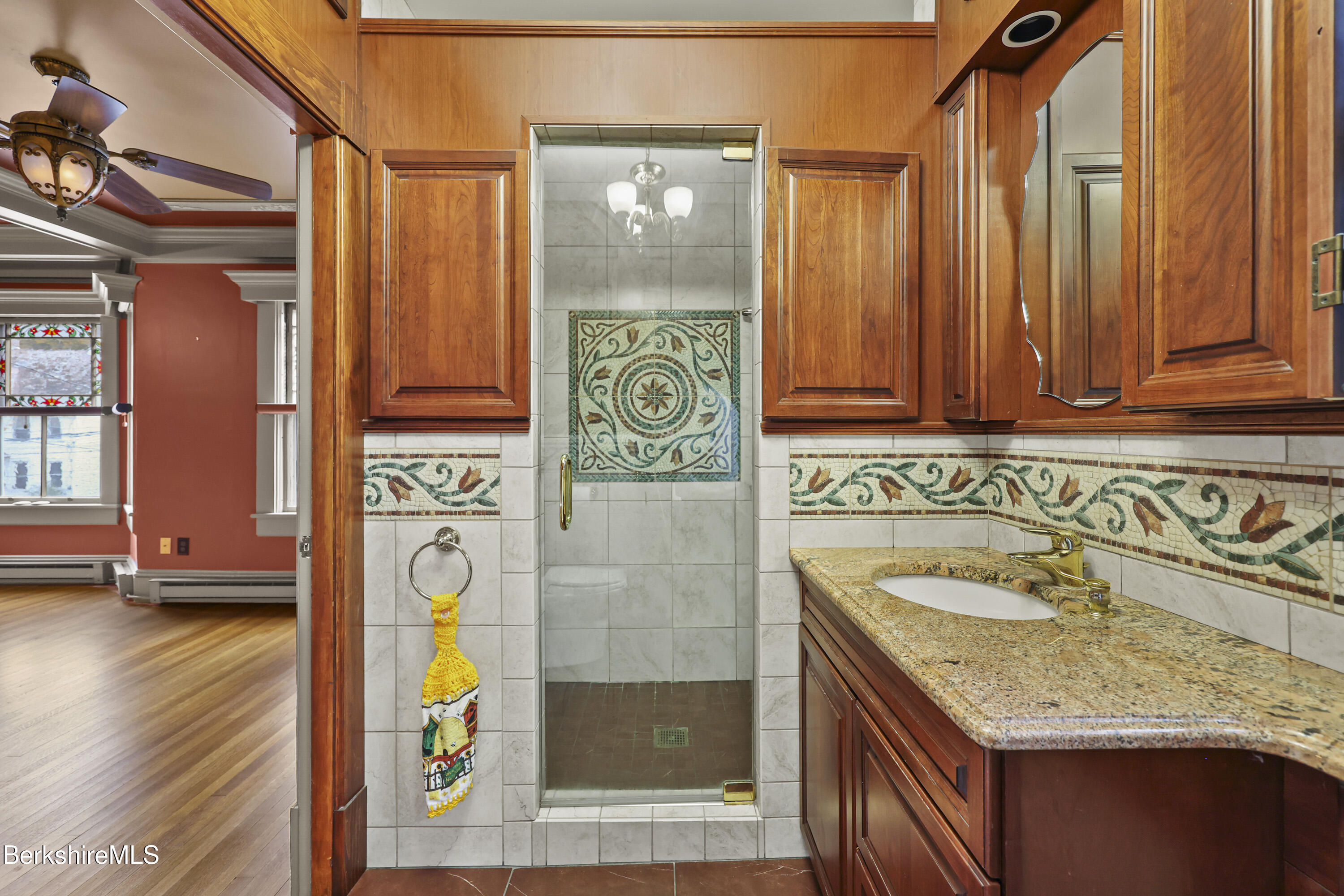 30 Summer Street Adams, MA 01220 - Photo 42 of 57 a bathroom with a granite countertop sink and a shower