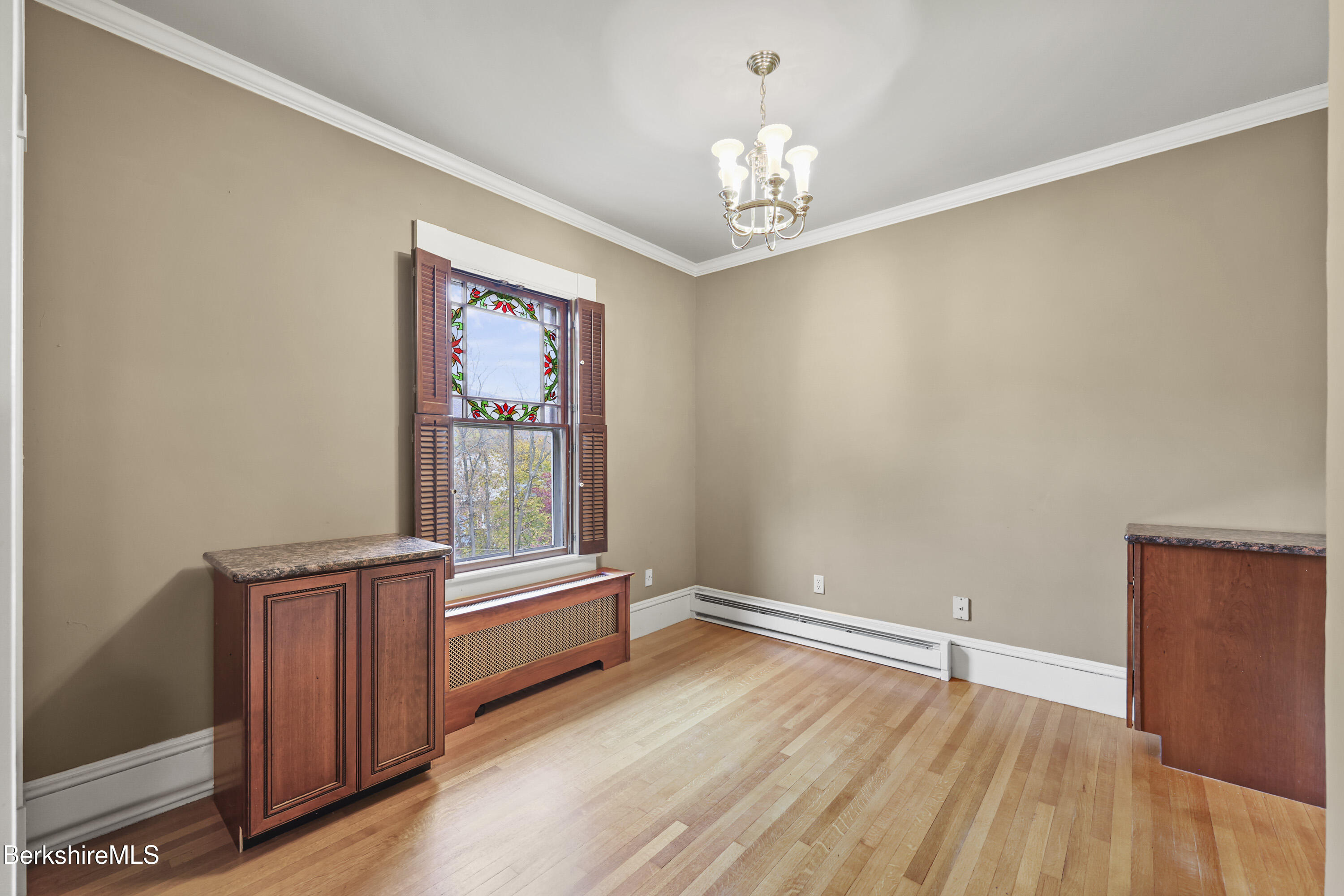 30 Summer Street Adams, MA 01220 - Photo 45 of 57 a living room with furniture and a chandelier