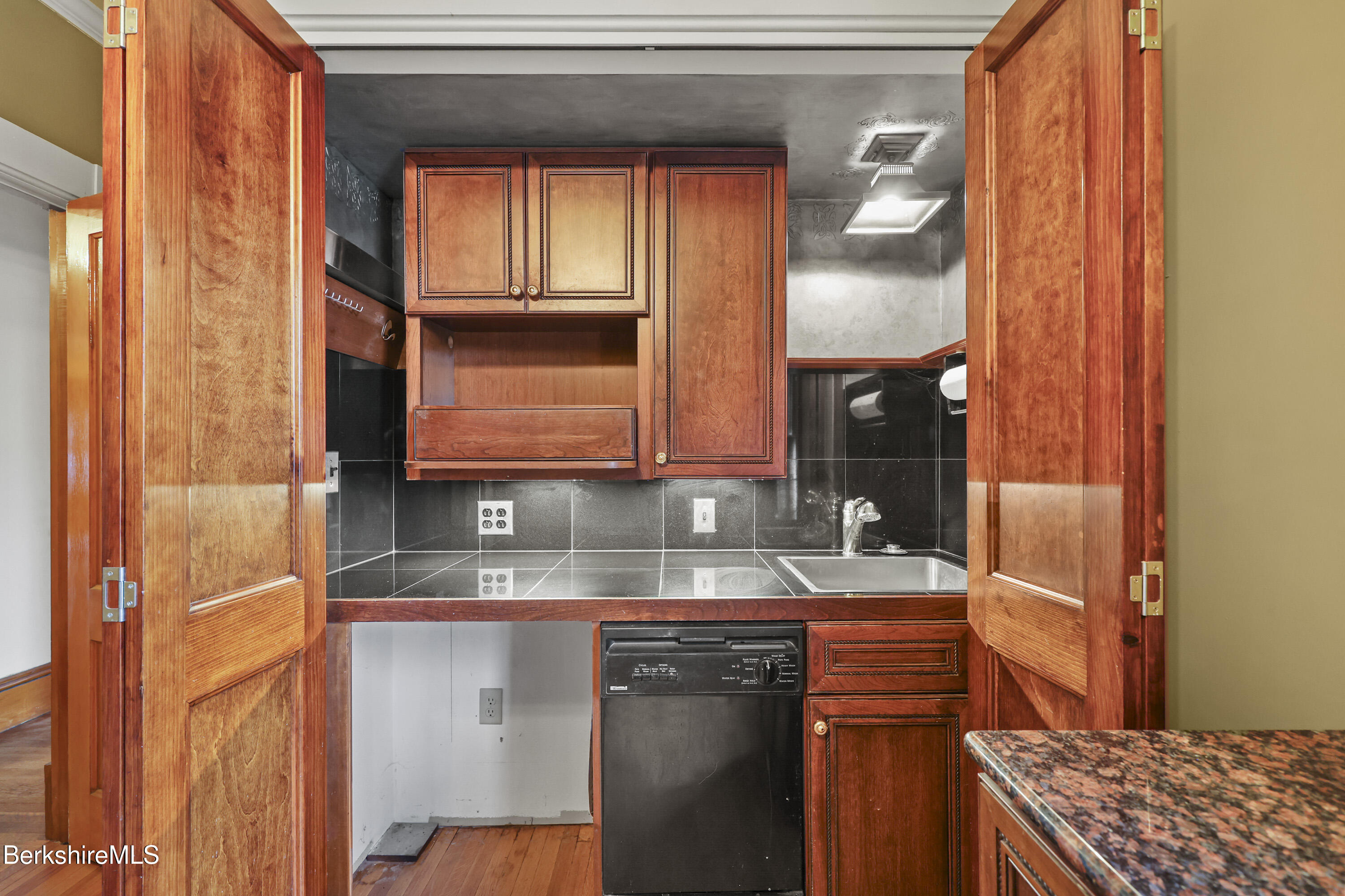 30 Summer Street Adams, MA 01220 - Photo 47 of 57 a bathroom with a sink and a mirror