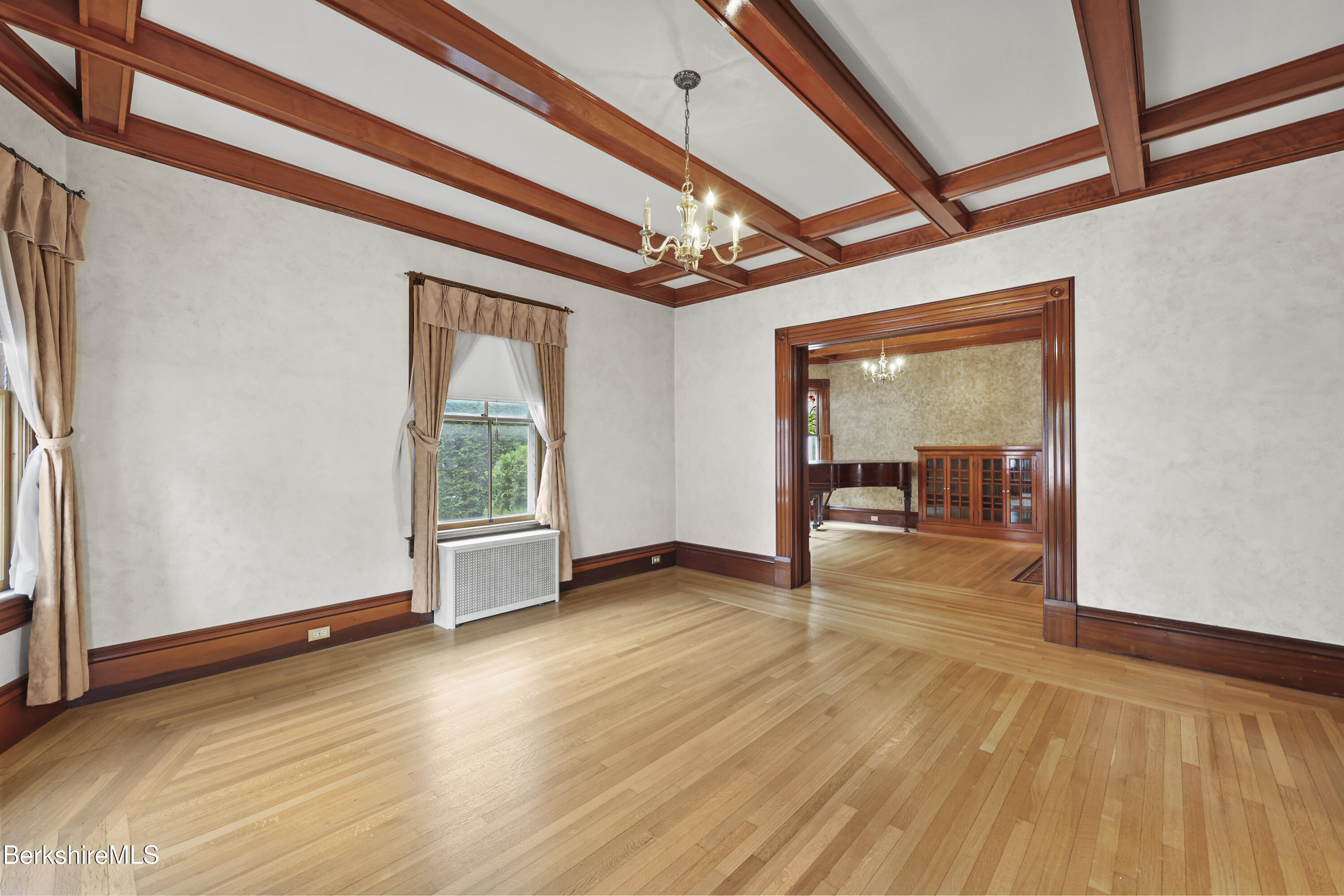 30 Summer Street Adams, MA 01220 - Photo 8 of 57 a view of an empty room with wooden floor and a window