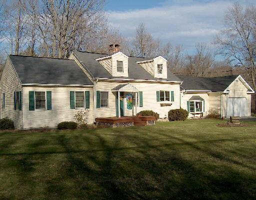 77 Stony Hill Road Brookfield, CT 06804 - Photo 1 of 1 a front view of a house with a garden