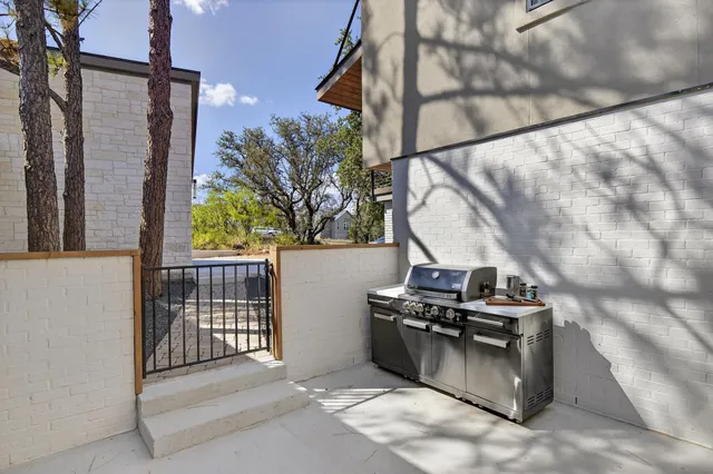 a view of outdoor space and barbecue grill