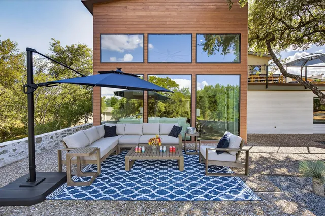 a outdoor living space with furniture and garden view