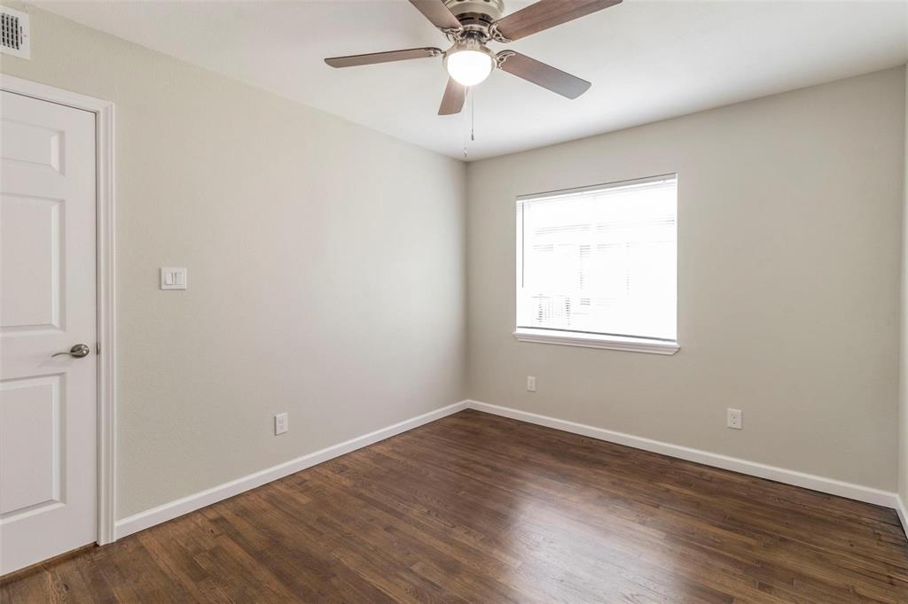 4714 Old Benbrook Road Fort Worth, TX 76116 - Photo 5 of 15 a view of a room with wooden floor and windows