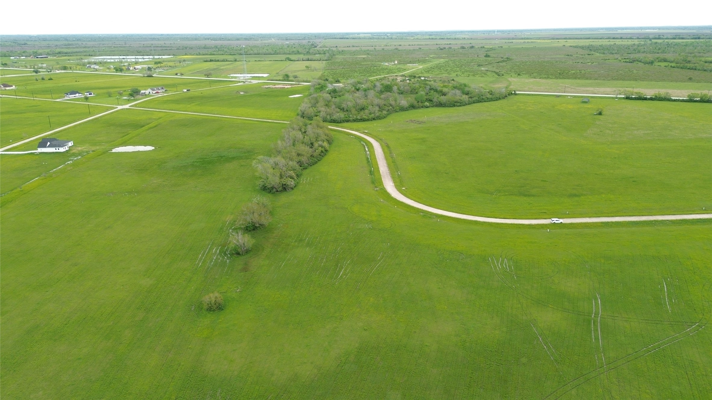 504 Brahman Trail Angleton, TX 77515 - Photo 3 of 8 a view of a tennis court
