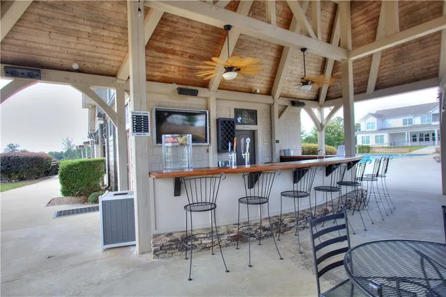 a view of entryway and hall with dining room