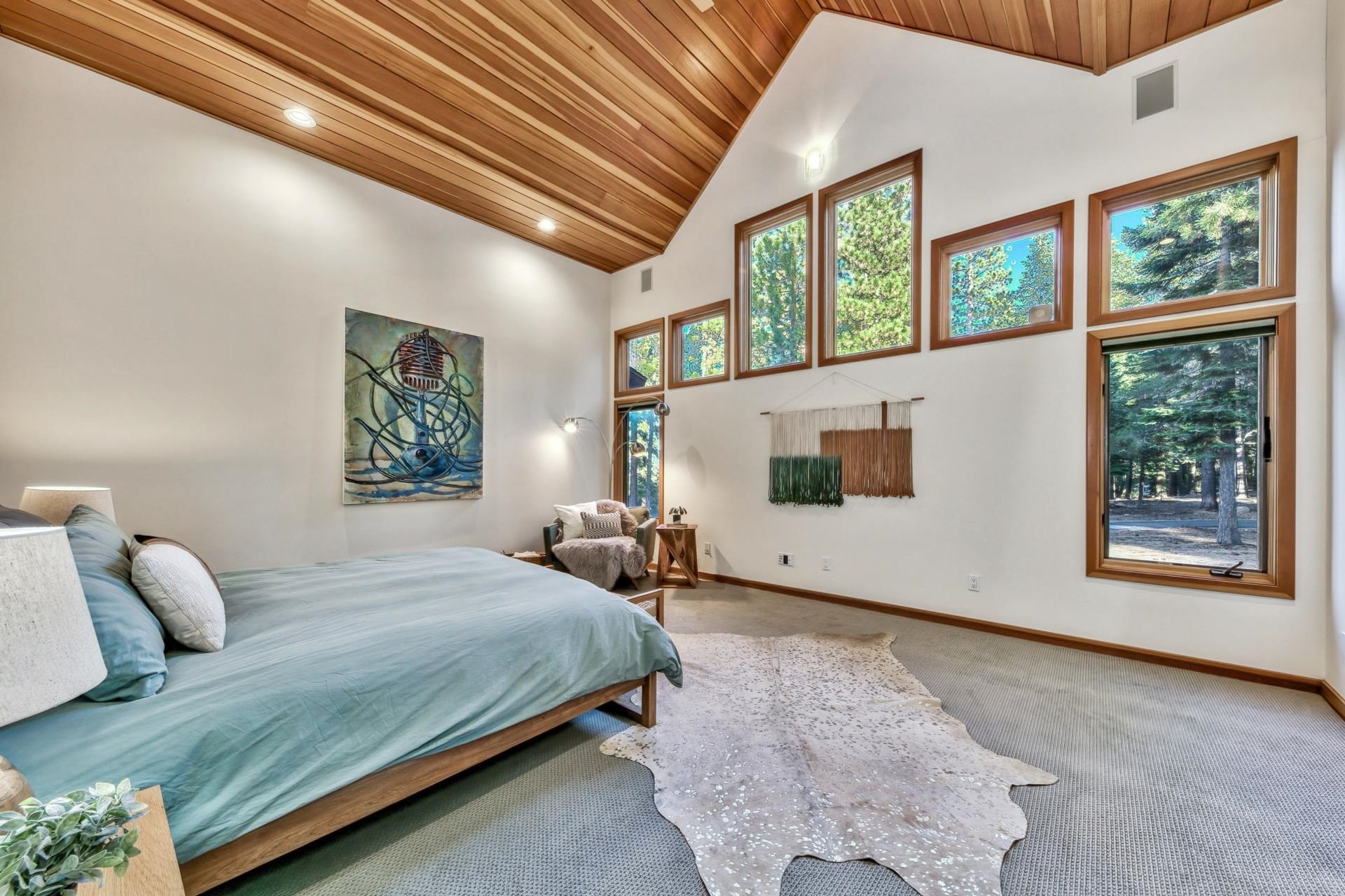 12998 Timber Ridge Road Truckee, CA 96161 - Photo 12 of 21 a bedroom with a large bed and a window