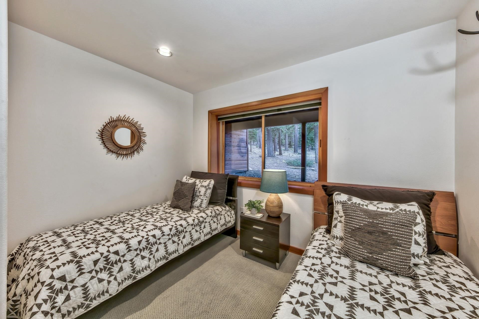 12998 Timber Ridge Road Truckee, CA 96161 - Photo 17 of 21 a bedroom with bed and a window