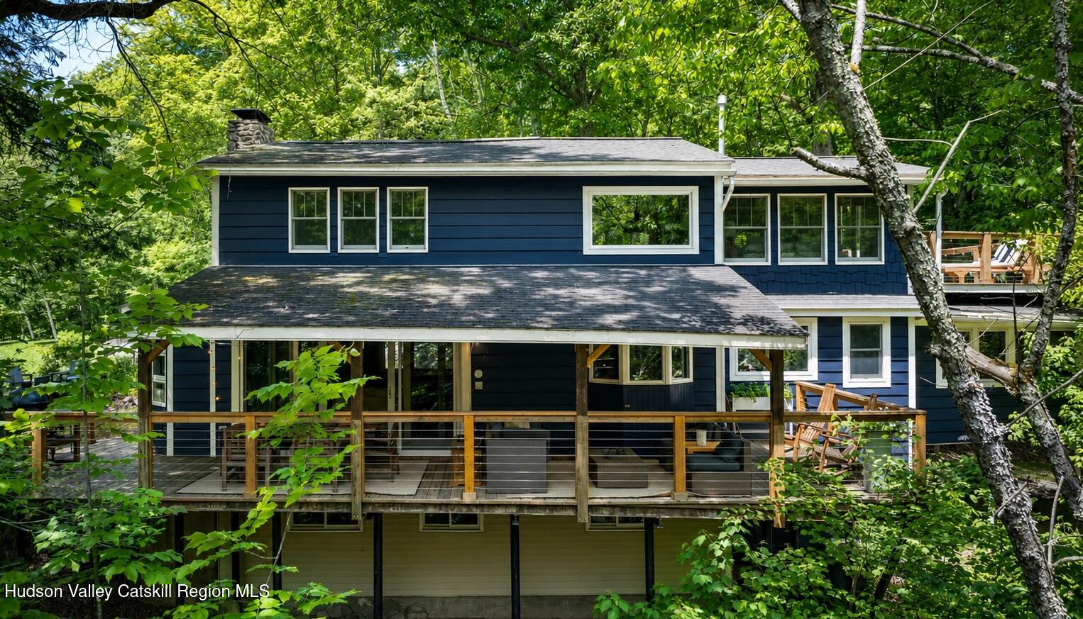 22 Old Mill Road Stephentown, NY 12169 - Photo 6 of 55 a front view of a house with a garden
