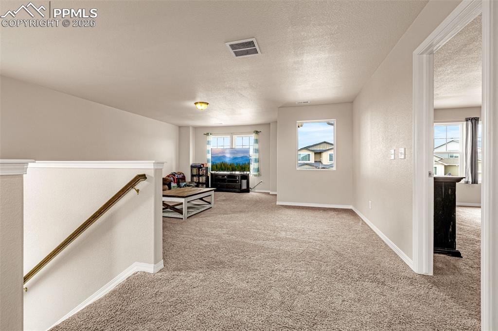 9074 Vanderwood Road Colorado Springs, CO 80908 - Photo 18 of 36 Huge loft great as a flex space, rec room, etc.