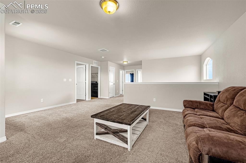 9074 Vanderwood Road Colorado Springs, CO 80908 - Photo 19 of 36 Oversized loft or space to frame out a 4th bedroom