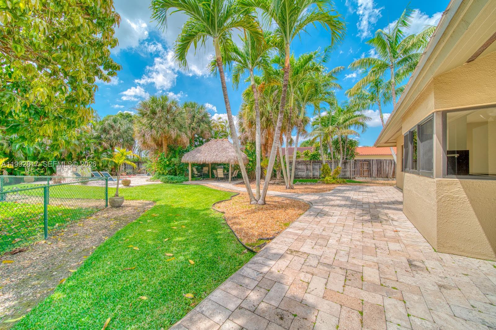 7320 Southwest 100th Court Miami, FL 33173 - Photo 31 of 36 a view of a house with a yard