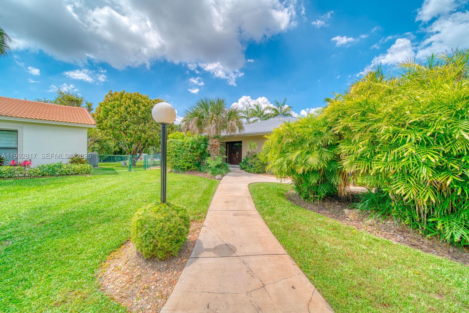 7320 Southwest 100th Court Miami, FL 33173 - Photo 34 of 36 a view of a yard with plants