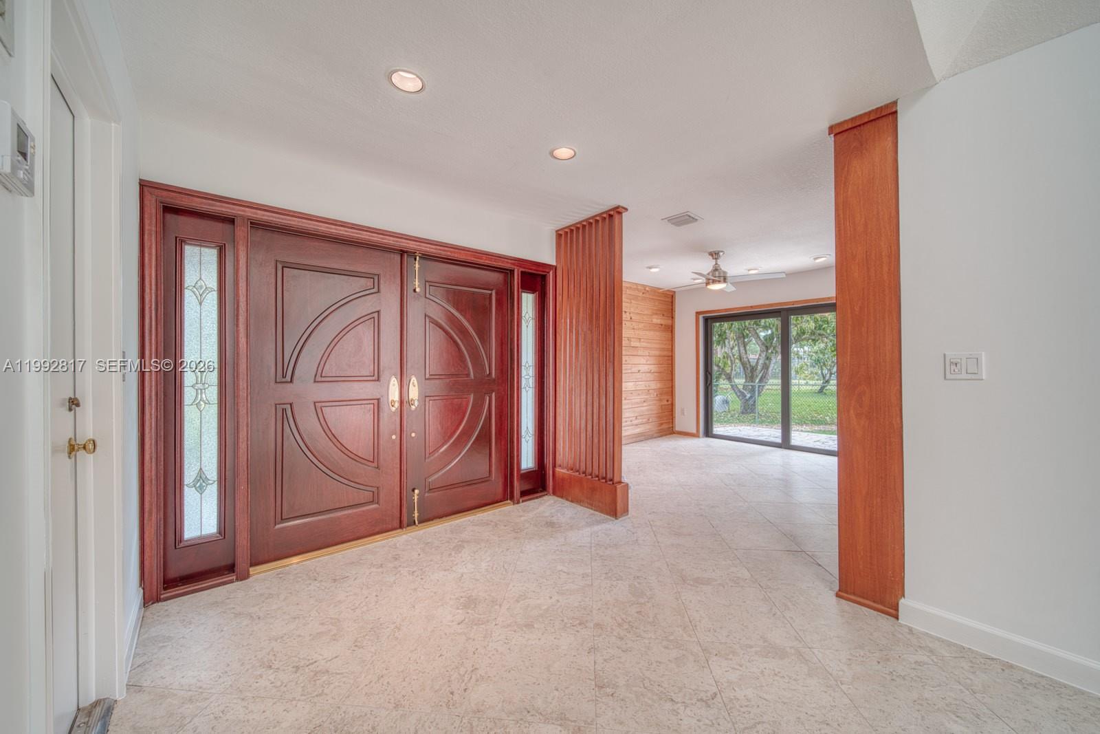 7320 Southwest 100th Court Miami, FL 33173 - Photo 5 of 36 a view of a livingroom with a dishwasher and a window