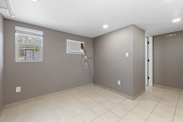 a view of an empty room with window