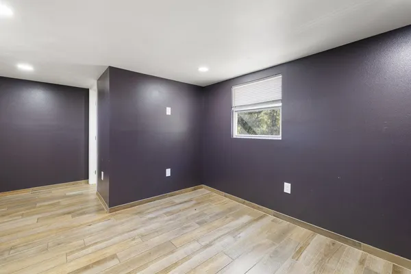a bathroom with a toilet sink and shower