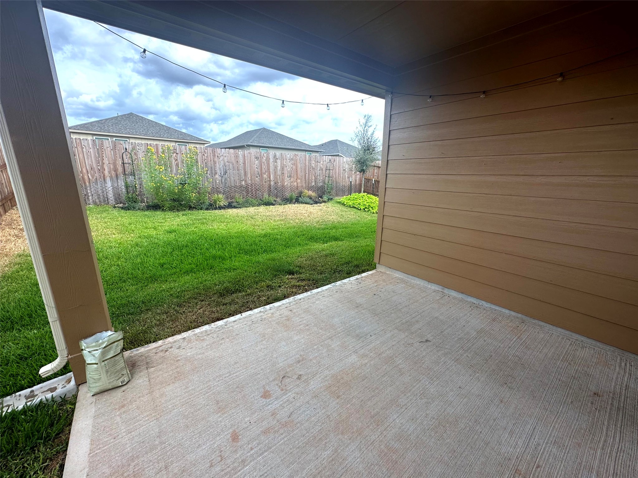 7072 Silverleaf Oak Street Conroe, TX 77304 - Photo 16 of 18 Covered, concrete patio.