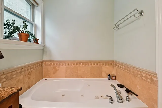 a bathroom with a bathtub