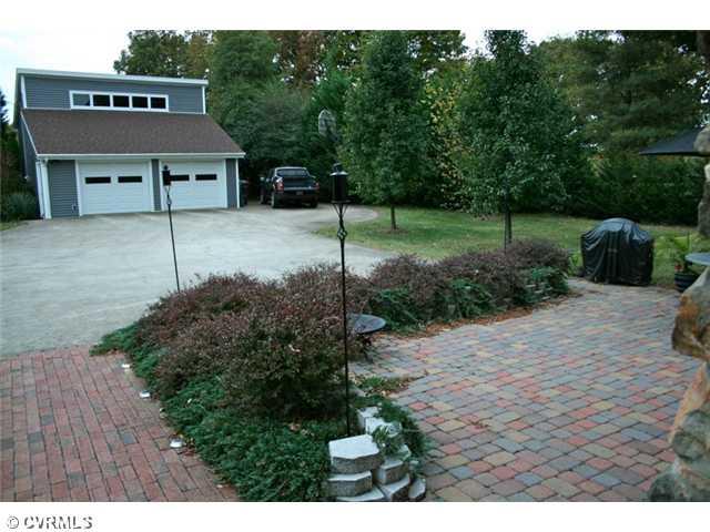 1300 Cardwell Road Crozier, VA 23039 - Photo 11 of 12 Parking Lot/Garage - View from front door of front patio & garage.