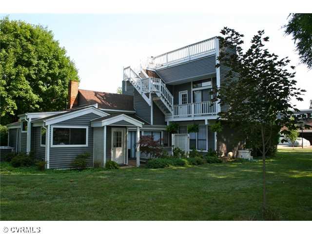 1300 Cardwell Road Crozier, VA 23039 - Photo 3 of 12 Exterior Back - Hot tub on patio outside 1st floor master. Balcony from 2nd flr. master.