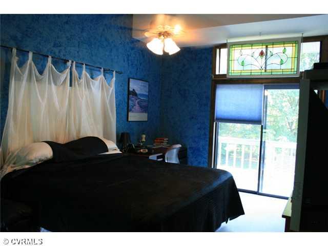 1300 Cardwell Road Crozier, VA 23039 - Photo 7 of 12 Master Bedroom - 2nd flr master w/vaulted ceiling, balcony to rooftop deck.