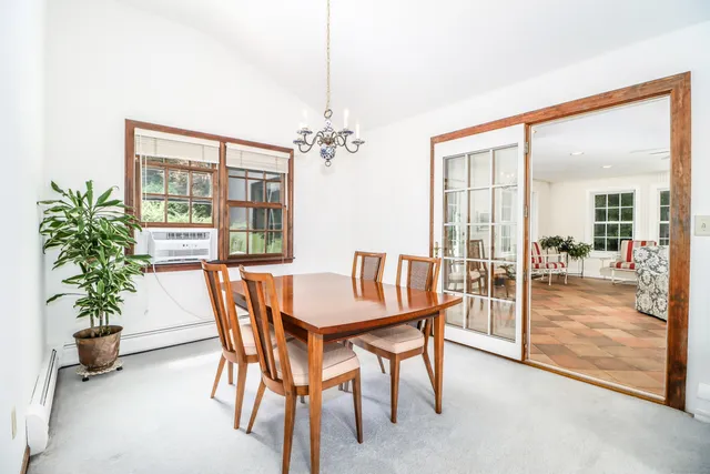 a kitchen with stainless steel appliances granite countertop a refrigerator a stove top oven a sink and dishwasher