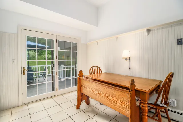 a bedroom with bed and window