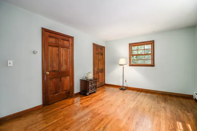 a living room with furniture or fireplace and a flat screen tv