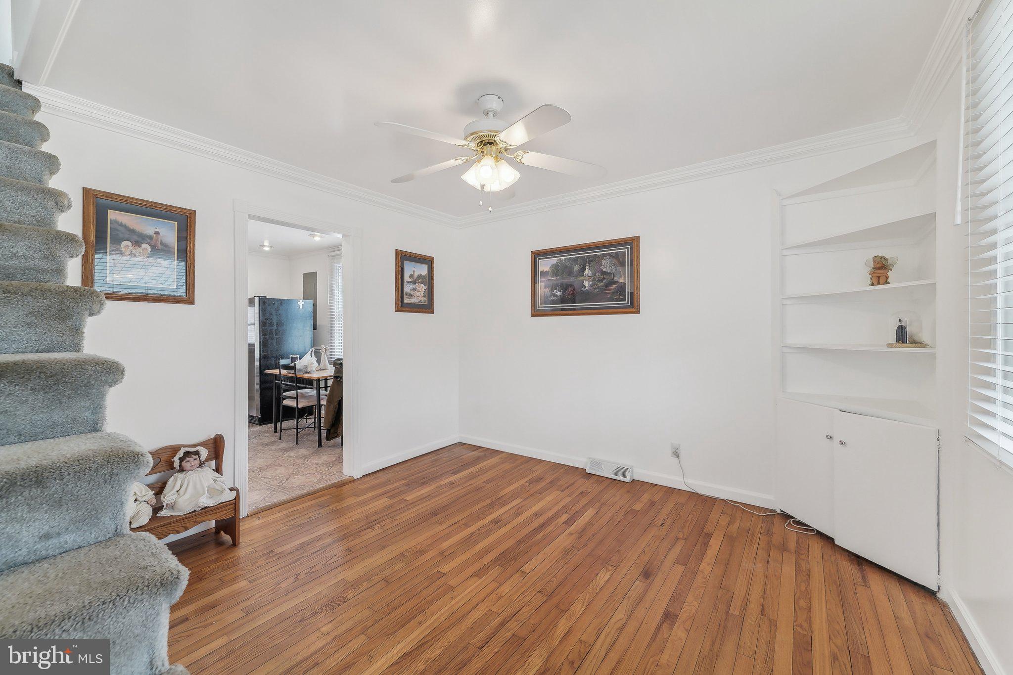 8218 Longpoint Road Dundalk, MD 21222 - Photo 8 of 30 a view of a livingroom with workspace and a window