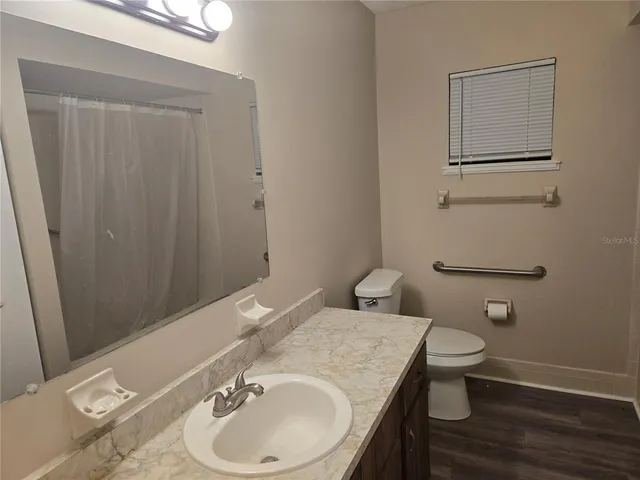 a bathroom with a sink and a toilet