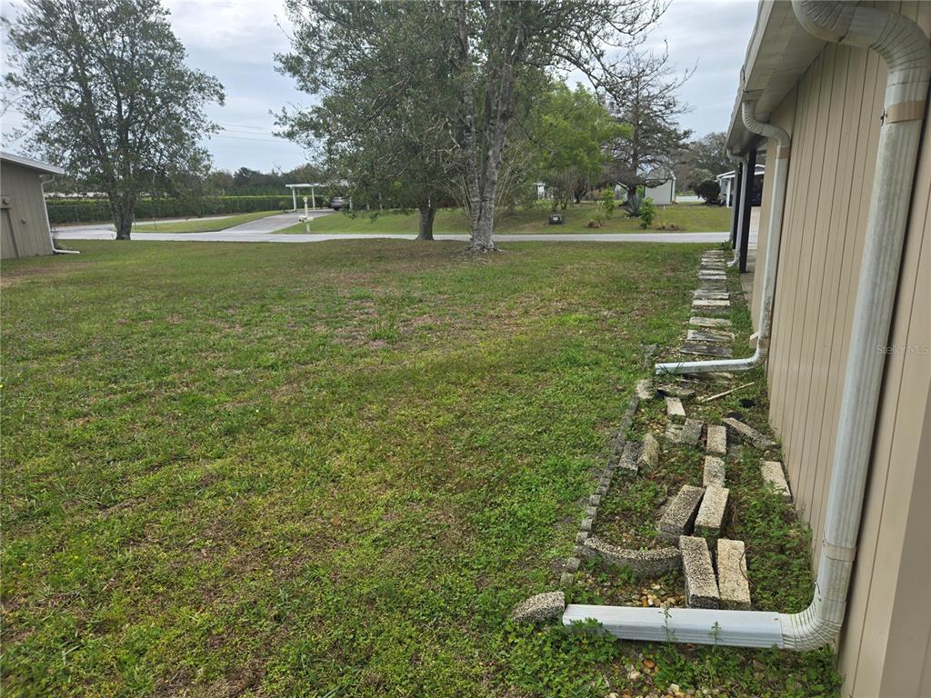 10040 Southwest 98th Avenue Ocala, FL 34481 - Photo 6 of 28 a view of a garden