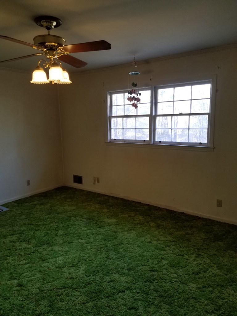 174 Hampton Hills Road Gray, GA 31032 - Photo 12 of 31 a view of an empty room with a window