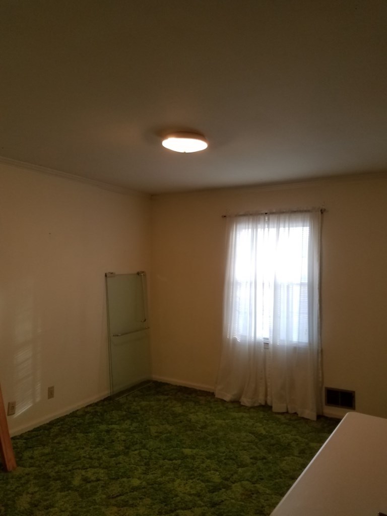 174 Hampton Hills Road Gray, GA 31032 - Photo 14 of 31 a view of an empty room and window