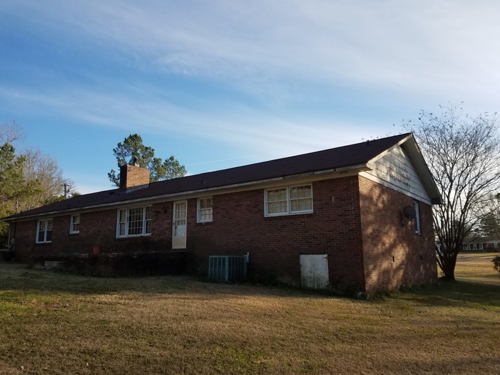 174 Hampton Hills Road Gray, GA 31032 - Photo 22 of 31 a front view of a house with a yard