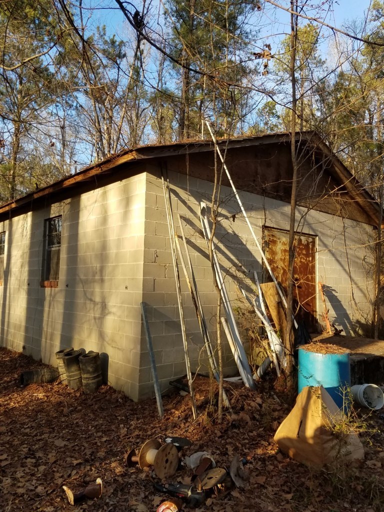 174 Hampton Hills Road Gray, GA 31032 - Photo 28 of 31 a blue and white house with a yard