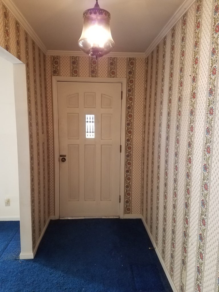 174 Hampton Hills Road Gray, GA 31032 - Photo 6 of 31 a view of a hallway with wooden floor