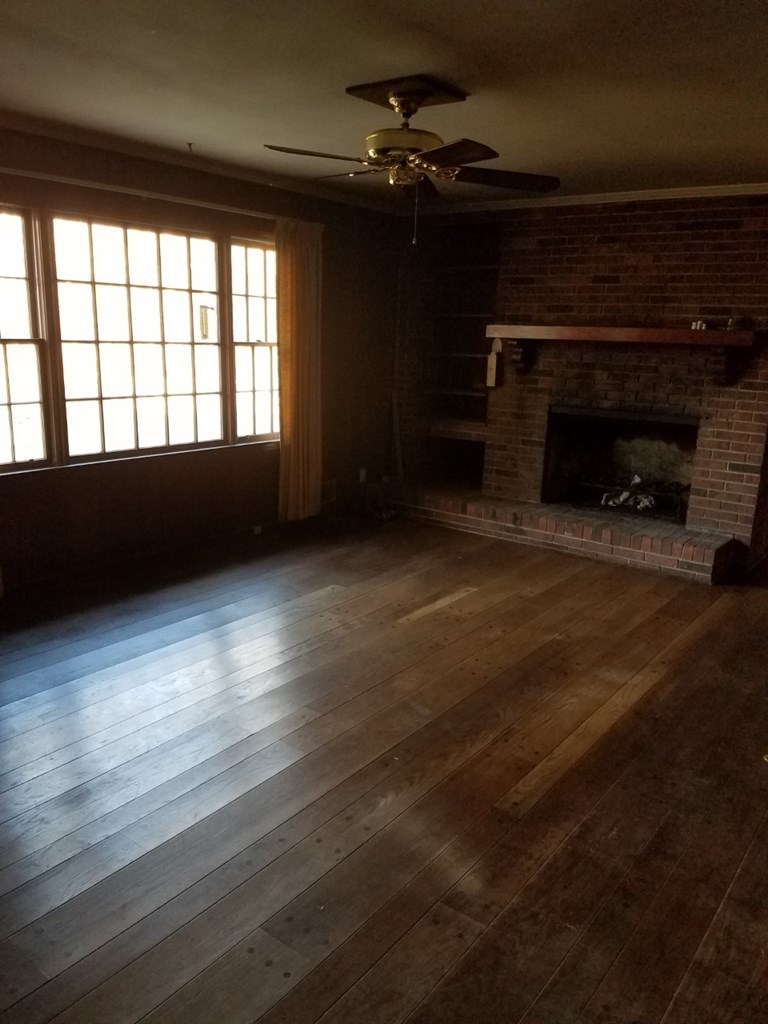 174 Hampton Hills Road Gray, GA 31032 - Photo 9 of 31 a living room with a fireplace