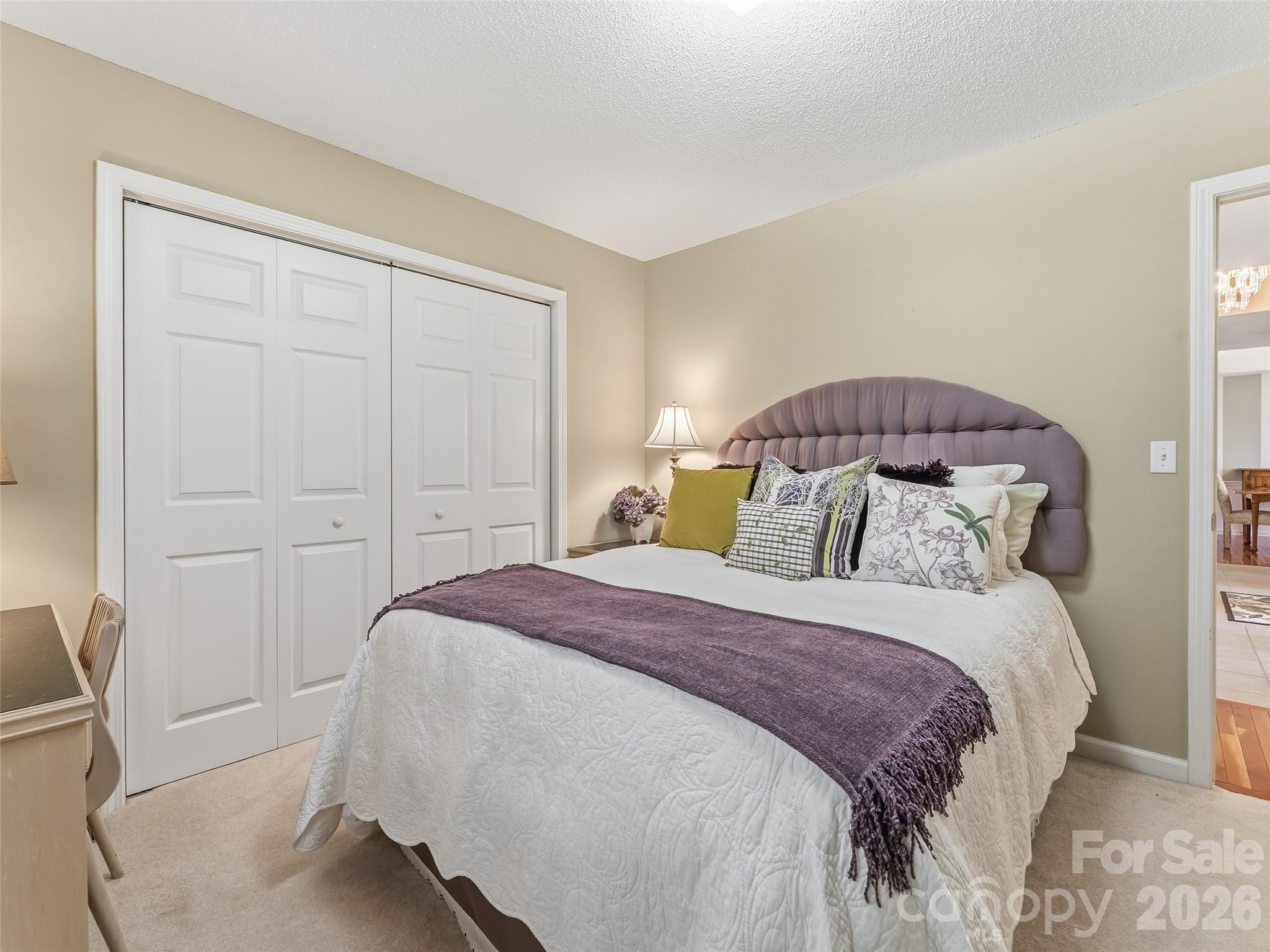 1340 Macedonia Road Saluda, NC 28773 - Photo 30 of 45 a bedroom with a bed and wooden floor