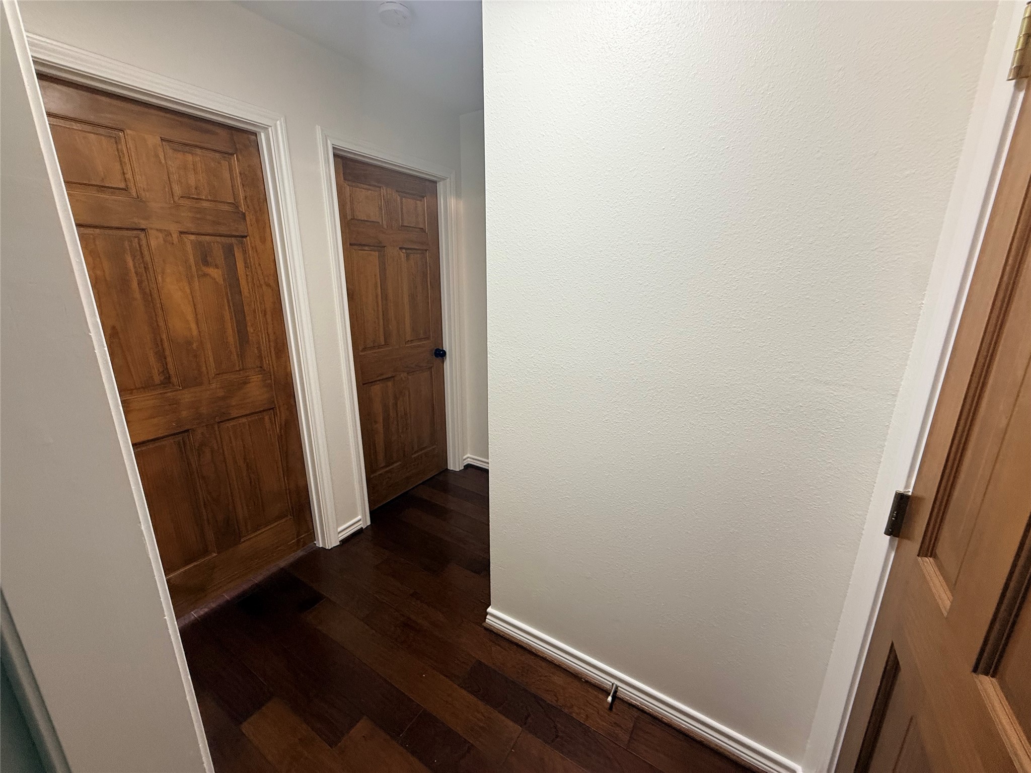 855 County Road 2267 Cleveland, TX 77327 - Photo 12 of 24 an empty room with wooden floor