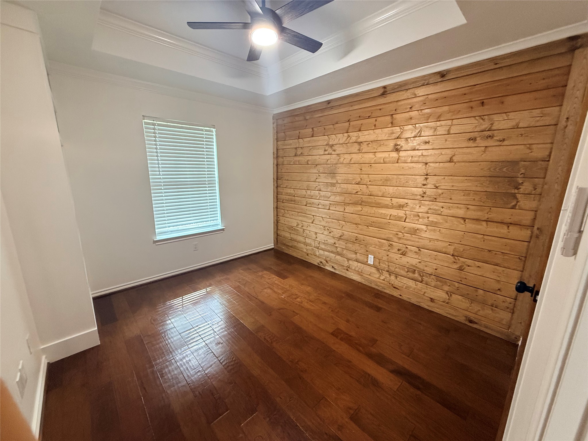 855 County Road 2267 Cleveland, TX 77327 - Photo 14 of 24 a view of an empty room and wooden floor near a window